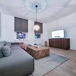 Alpha Apartments